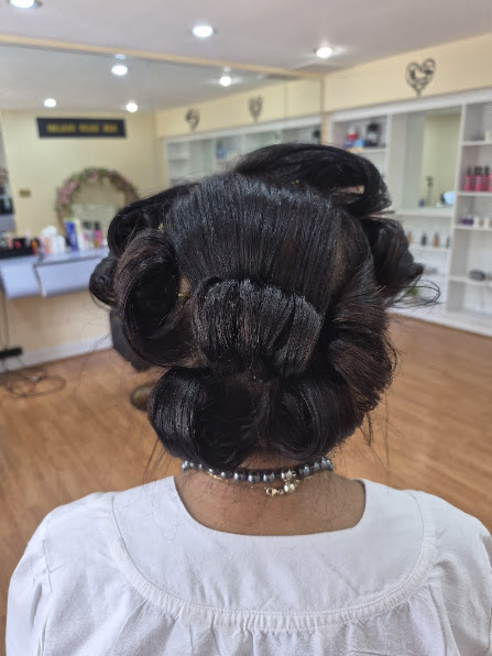 Rich golden balayage with soft wave finish